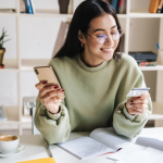 Young woman with credit card.
