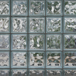 A wall of glass blocks that distorts and blurs what is on the other side.