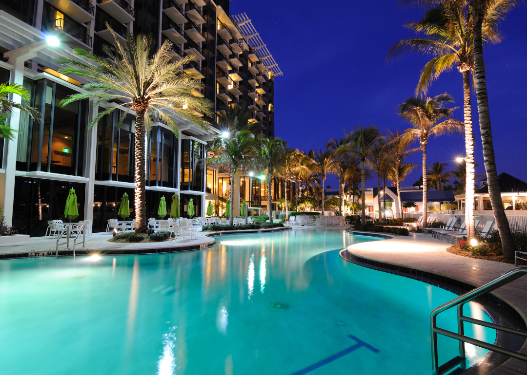 A resort swimming pool at twilight in Florida.